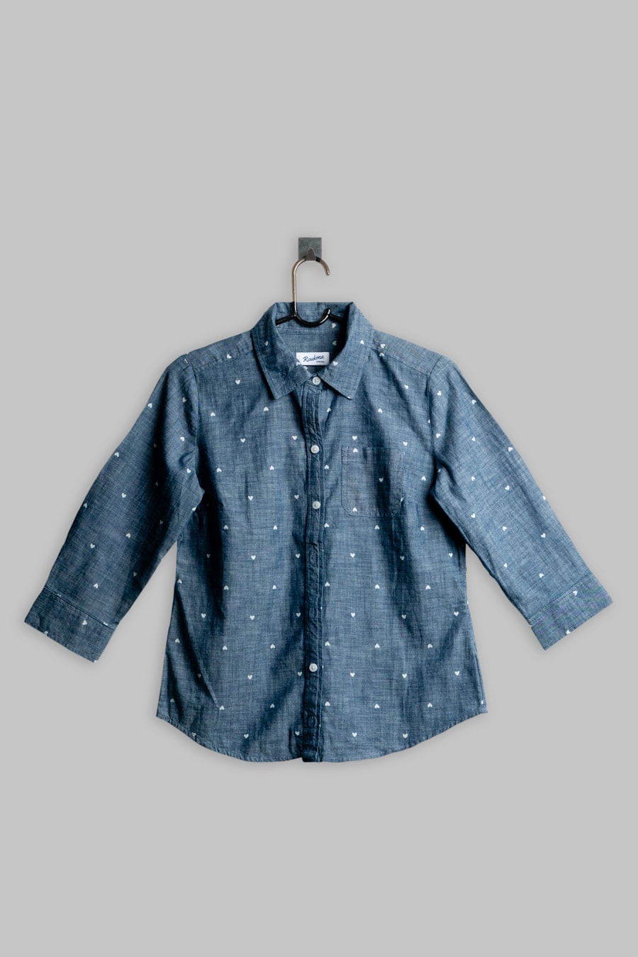 A blue shirt on a hanger